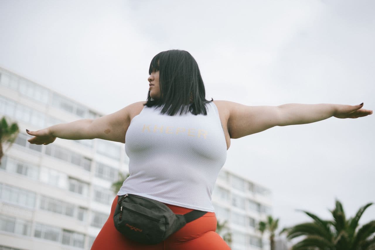 A woman practicing mindful movement outdoors